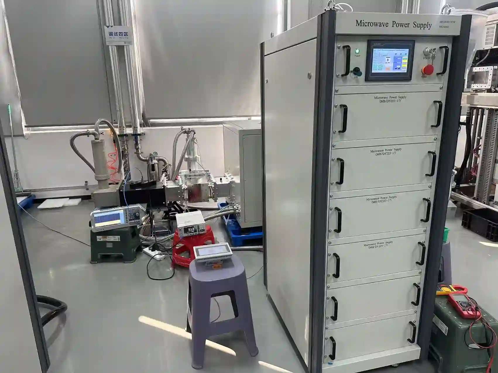 Testing scene for a 75 kW 915 MHz high-power microwave generator system