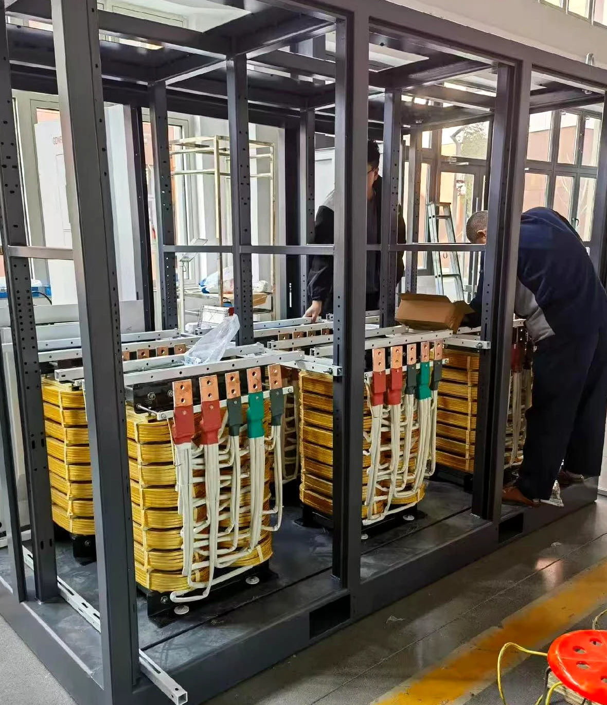 Partial discharge test power source assembly in progress at SDACME factory