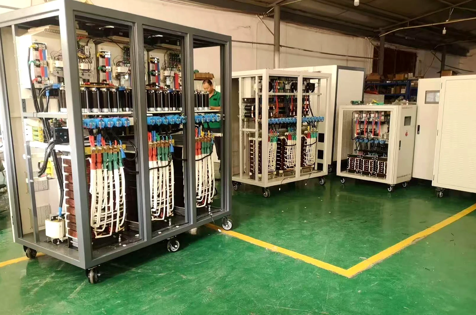 Multiple partial discharge-free test power source units in SDACME factory