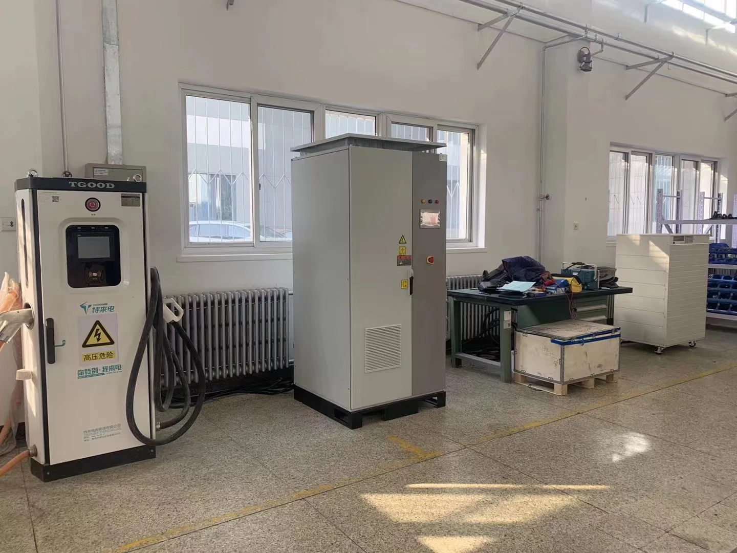 Battery emulator used with EV charging equipment in a DC test laboratory